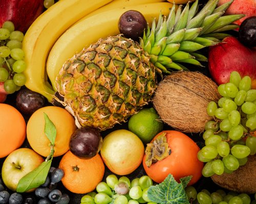 Assortment of healthy raw fruits. Mixed fruits.